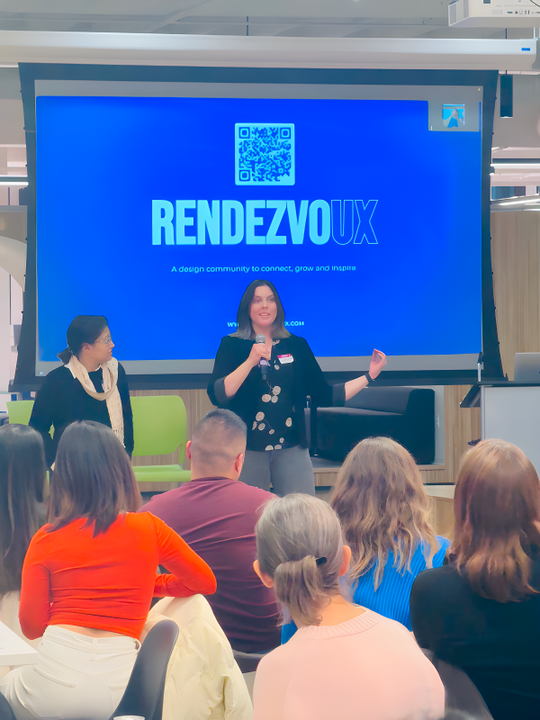 Amy presenting Rendezvoux to a group of community members.